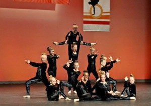 The Junior Competitive dancer's in their final pose for their Mission Impossible routine.