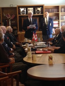 David Tilson MP, presenting Tribute Pins and Certificates to World War II Veterans