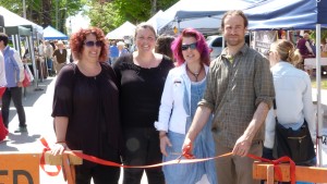 Photo by Marni Walsh (Left to right) Farmers' Market Committee Jodi Jones, Shawnette Crouse, A.J. Cavey, and Chair Joe Lemieux cut the ribbon to officially open the market on Thursday June 21st at First and Owen Sound Street. The market moved into the downtown core of Shelburne to become more accessible to residents and increase business traffic. Joe Lemieux reported a very successful start to the season with excellent crowds and receipts. Vendor's produce included baked goods, meats, fresh vegetables, maple syrup, honey, Indian cuisine, catering, crafts, art, and balloon and face painting for the kids.