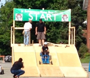 Carter Crouse age 11 coming down the ramp on his Soap Box Derby car.