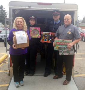 From left to right Barbara, Stephanie, Dennis and Andrew owner of Giant Tiger pictured her at the “Stuff a Cruiser” event.